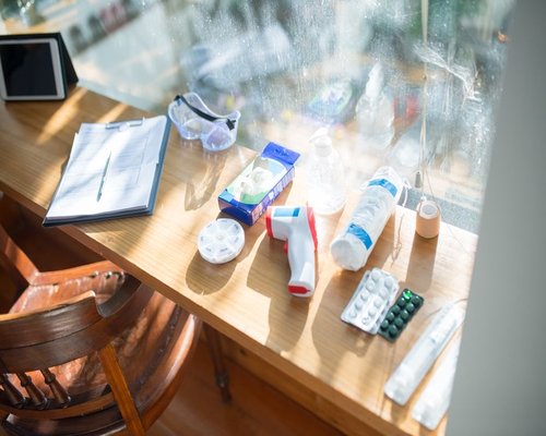 Sunlight streaming through a window onto a desk